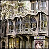 Street level view of Gaudi's Casa Battlo, a fanciful apartment building on the Block of Discord