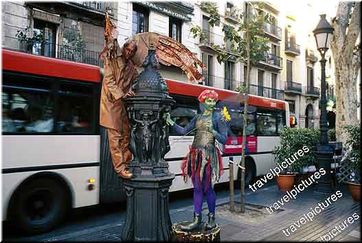 Two of many pantomime artists pretending to be statues on Las Ramblas