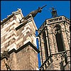 Tourists can ride a little elevator up to the roof to look at gargoyles and a great view of Barcelona.