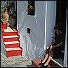 Frigiliana - doorway. The brightly painted steps are unusual in Frigiliana.